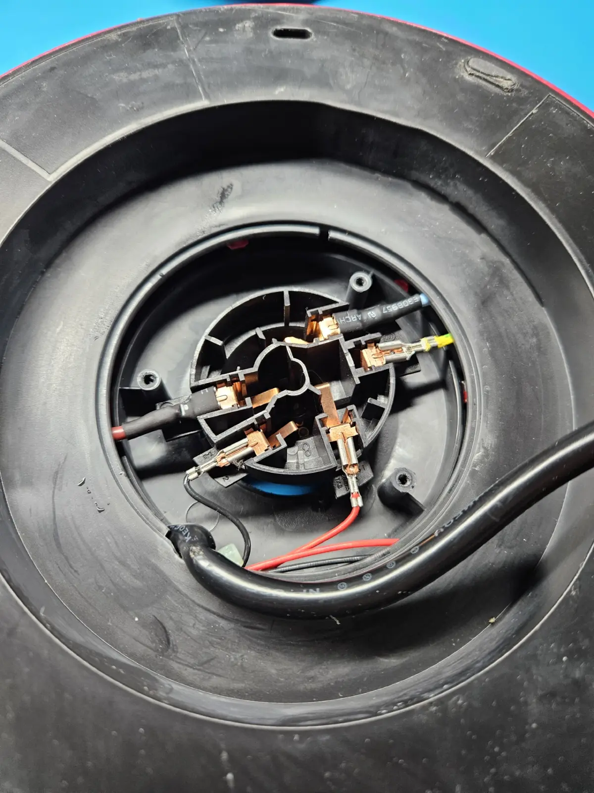 KitchenAid kettle base opened, showing the Strix connector and wiring